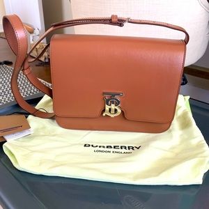 Medium size TB Burberry bag.